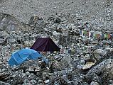 Rolwaling 08 01 Camp Below Tashi Lapcha Pass In Thame Valley The trail finally leaves the snow behind, passes glacial Parchemuche Tsho Lake, before my energy gave out and we decided to camp at about 4800m after almost three hours from the Tashi (Tesi) Lapcha pass.